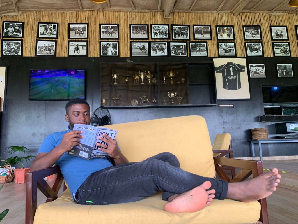 Daniel Adeyemi reading a book